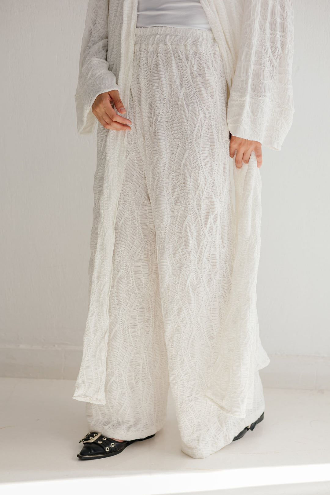 Modest essence in white