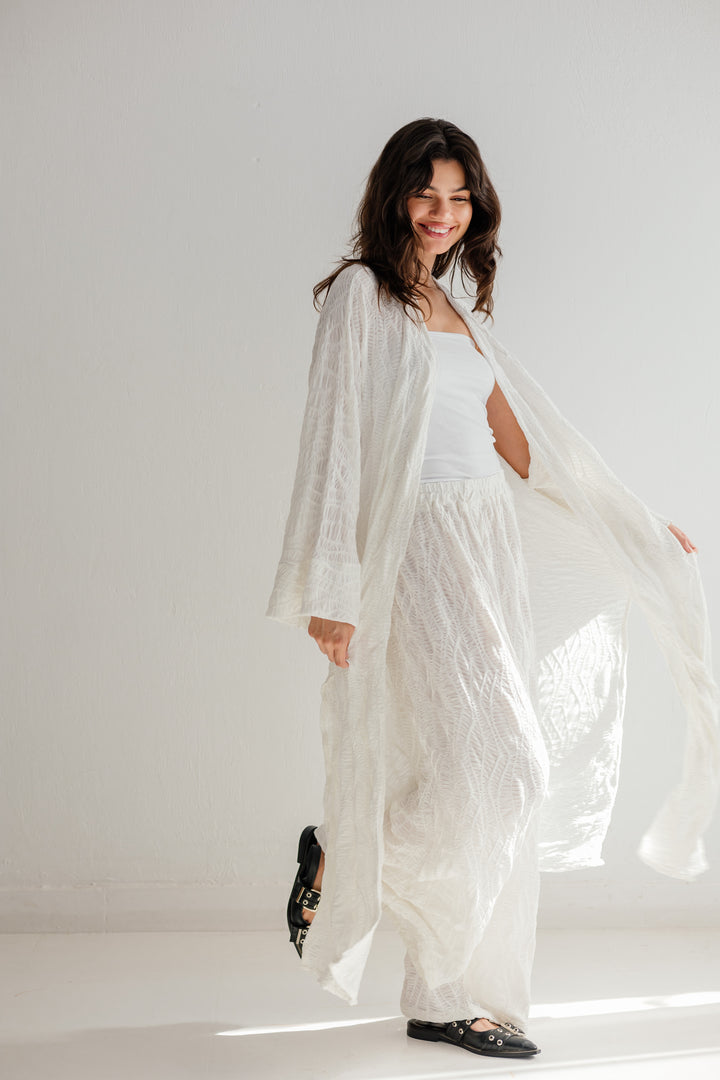 Modest essence in white